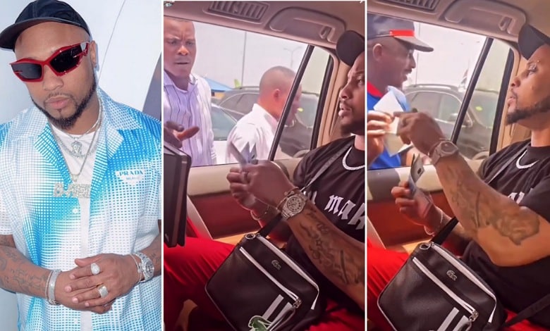 Davido's cousin, B-red spotted giving out money on the street (Video)