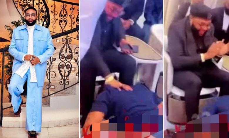 Netizens express disgust as man bows to kiss billionaire, E-Money’s hands and feet (Video)