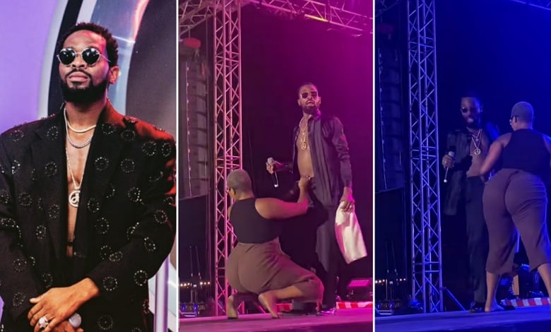 Moment a female fan attempted to caress Dbanj's private area on stage (Video)