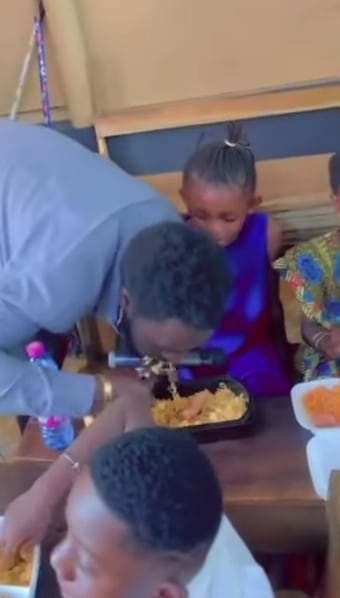 Primary school teacher eating pupil's food 