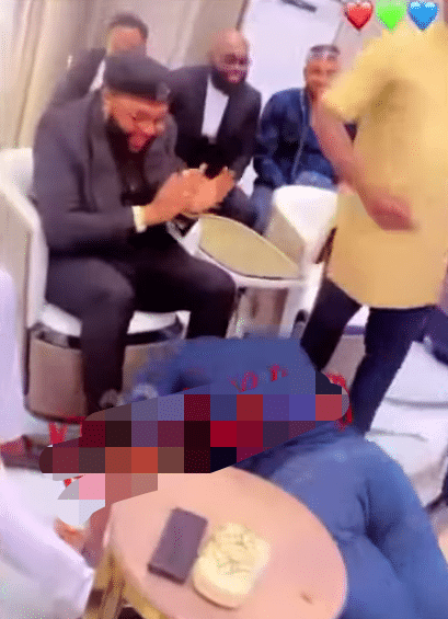 Netizens express disgust as man bows to kiss billionaire, E-Money’s hands and feet (Video)