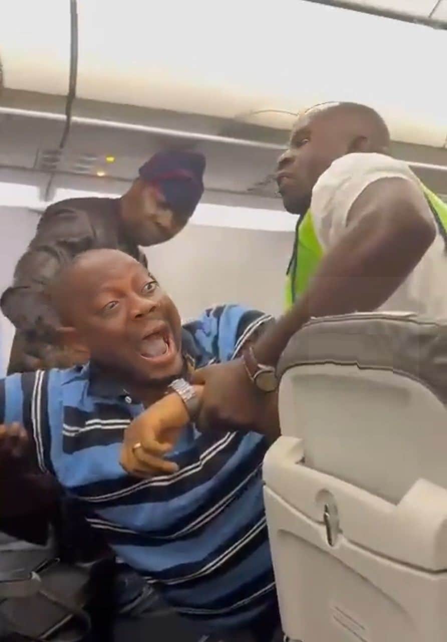 Passenger dragged off plane for inciting violence, saying 'Tinubu cannot be sworn in' (Video)