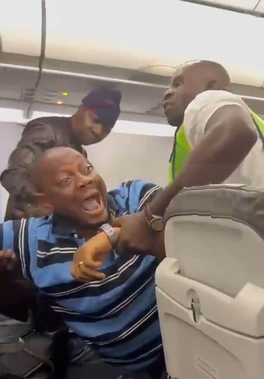 Passenger dragged off plane for inciting violence, saying 'Tinubu cannot be sworn in' (Video) 