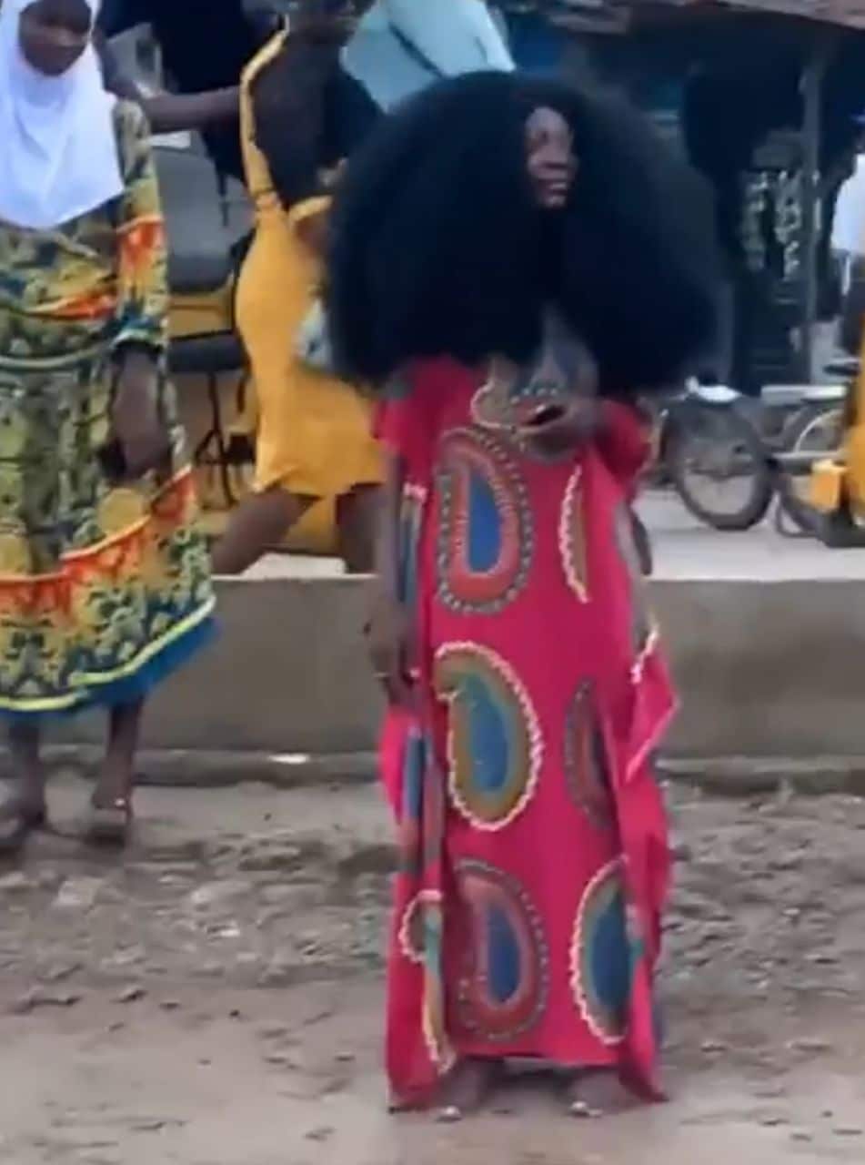 Drama as lady with unique hair size causes standstill (Video)