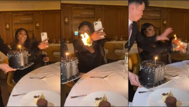 Moment lady's outfit catches fire while making video of birthday cake