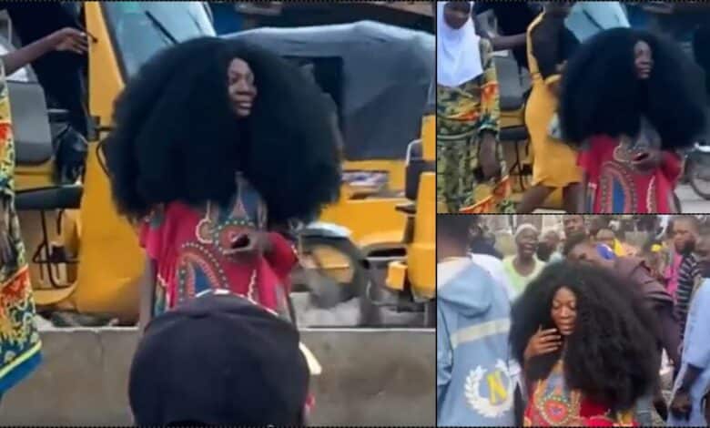 Drama as lady with unique hair size causes standstill (Video)