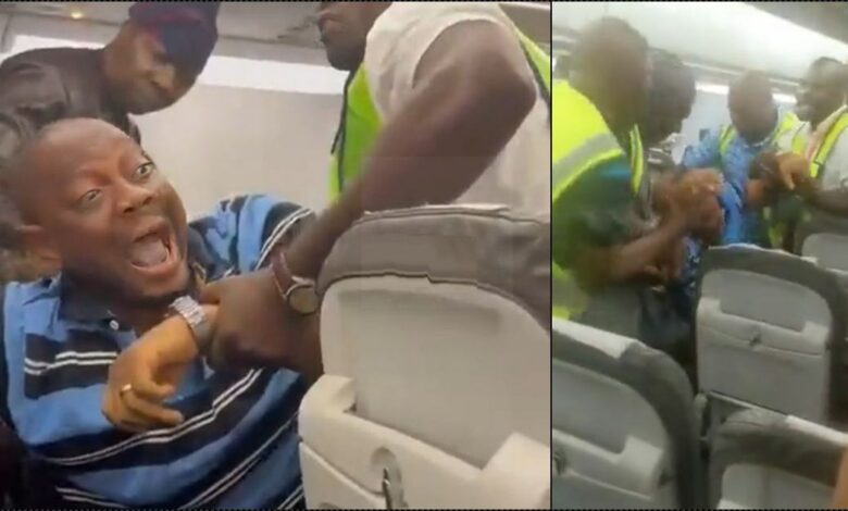 Passenger dragged off plane for inciting violence, saying 'Tinubu cannot be sworn in' (Video)