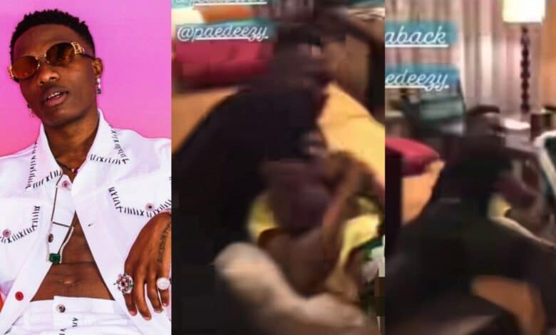 "He wan break him back?!" – Fans react as Wizkid's friend gives him WWE-style take down