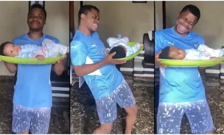 "Never leave babies with their daddies" - Reactions as man puts his baby on serving tray while dancing