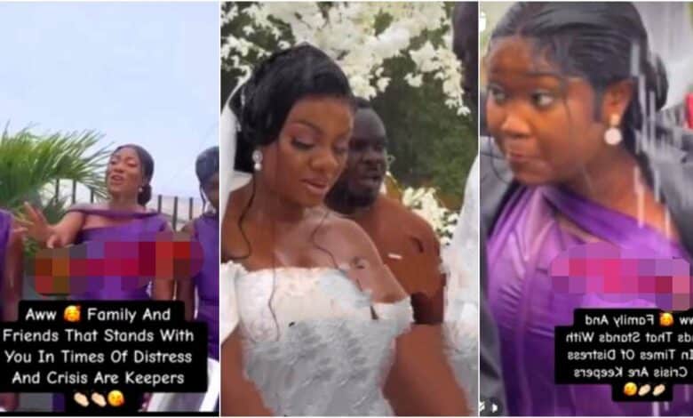 "This is beautiful" - Friends, family stand in heavy rain to celebrate couple on wedding day (Video)