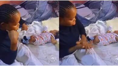 "I feel your pain" - Nigerian mother cries as fresh baby rejects small bed, sleeps on big mattress
