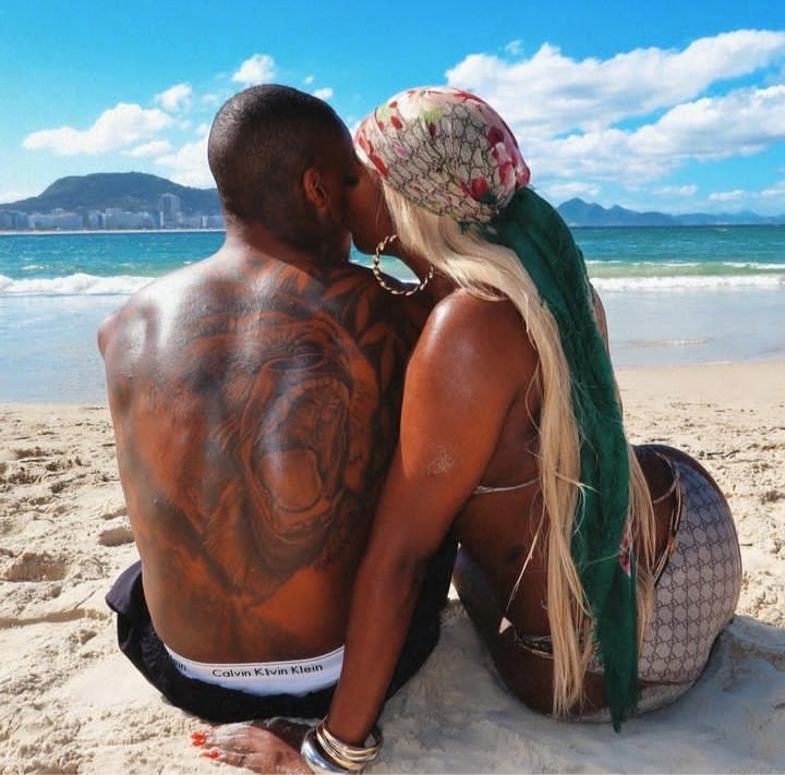 Tiwa Savage kisses mystery man