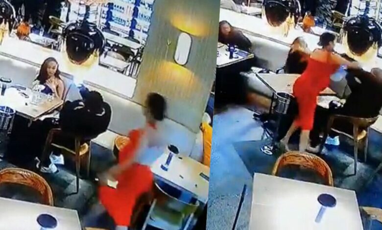 Pregnant side chick attacks boyfriend's main girlfriend in a restaurant