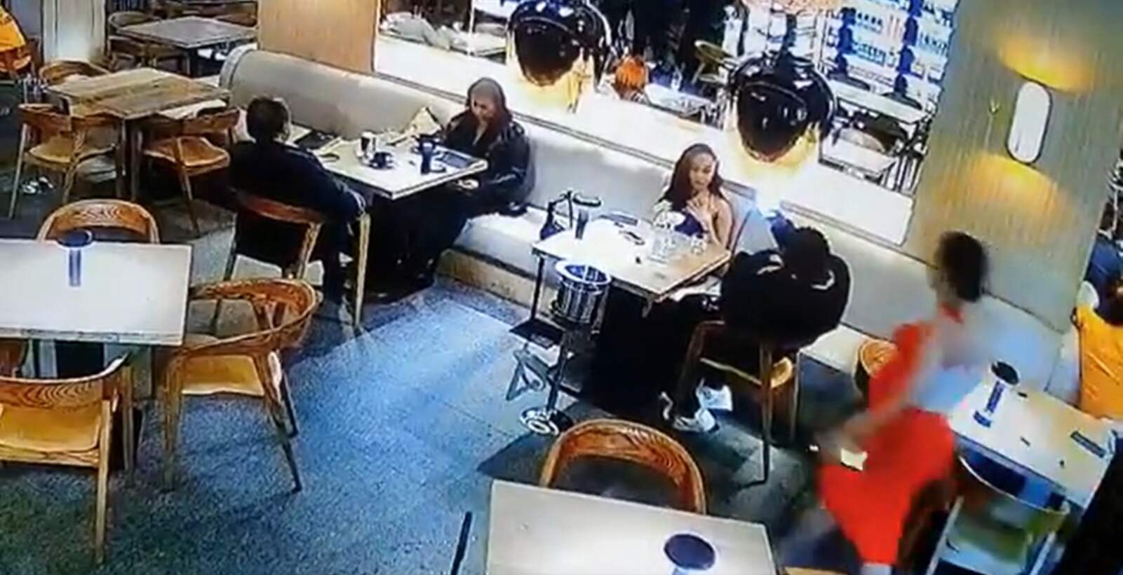 Pregnant side chick attacks boyfriend's main girlfriend in a restaurant