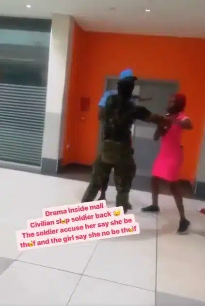 Moment lady lands a slap on a soldier who assaulted her first (Video)