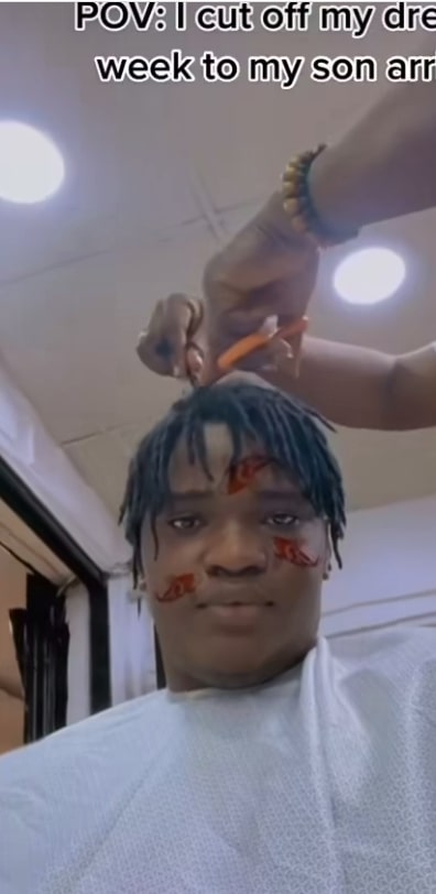 "Father figure activated" – Netizens commend man as he shaves off his dreadlocks for arrival of his son (Video) 