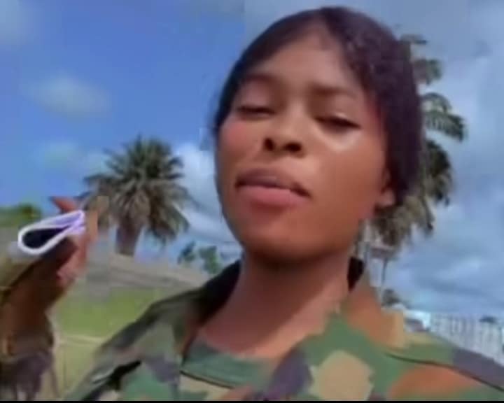 "I fit snatch your man, beat you join" – Military lady tells women (Video) 