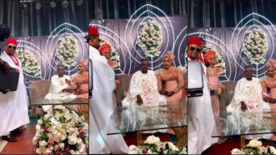 Couple speechless as businessman rains bails of money on them at their wedding (Video)