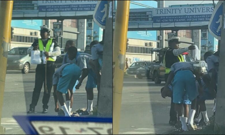 Police officer praised for giving out new socks, dressing students neatly (Video)