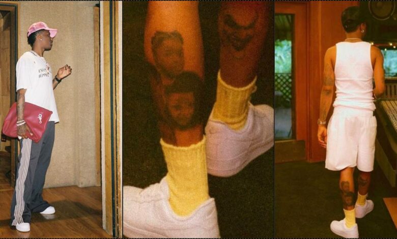 Wizkid tattoos his children's faces on his leg