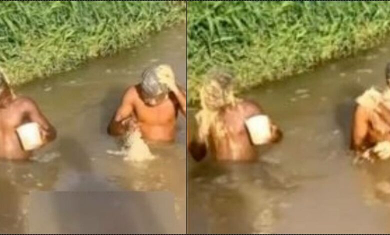 Young men bathing in river with special soap sparks speculations (Video)