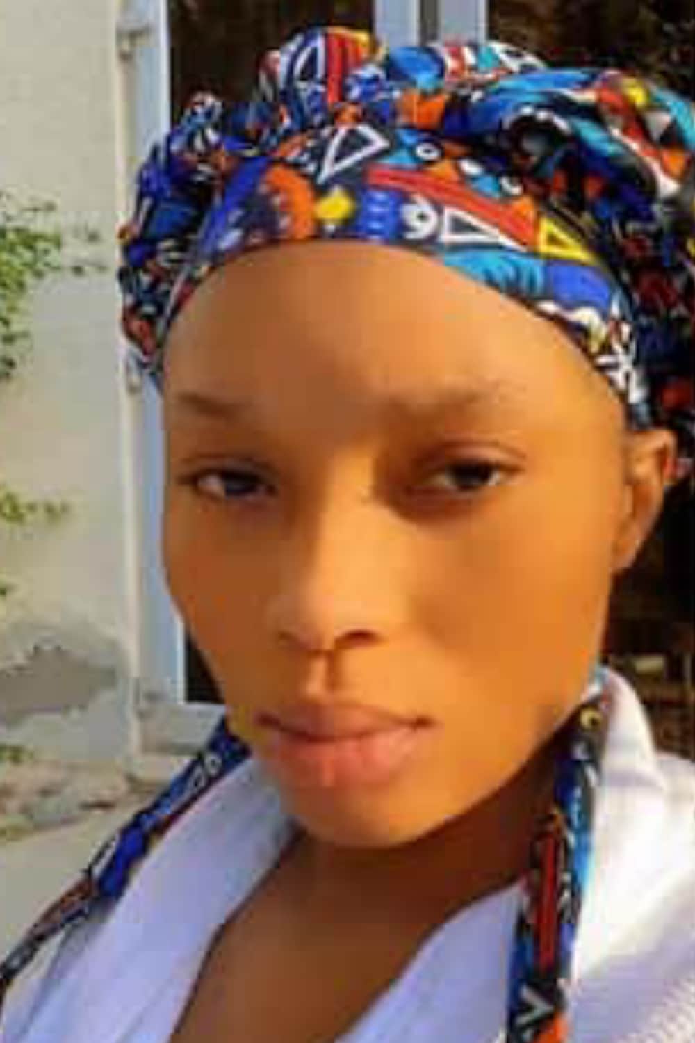 "She no buy wig”- Young Nigerian lady inspires many with self-built dream home, shares land documents (photos)