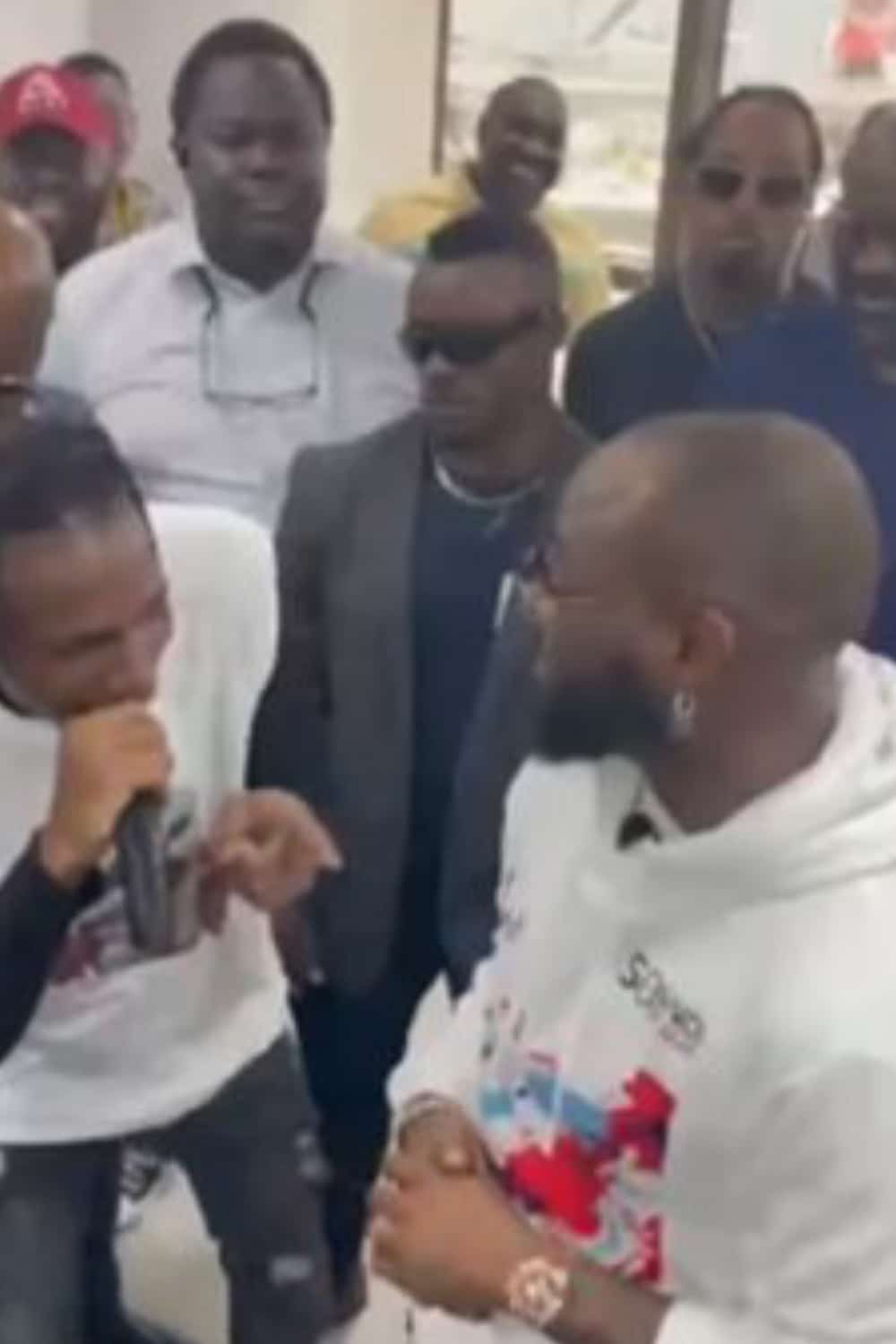 Up and coming singer impresses Davido with song at business event (Video)