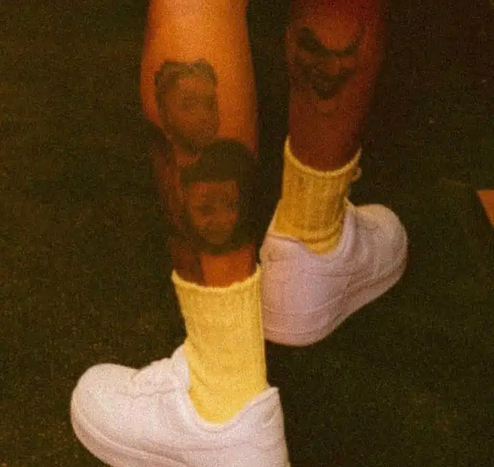 Wizkid tattoos his children's faces on his leg