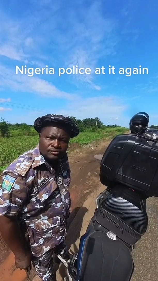 "Do us a favour, delete it" — Nigeria police begs biker after spotting security camera (Video)