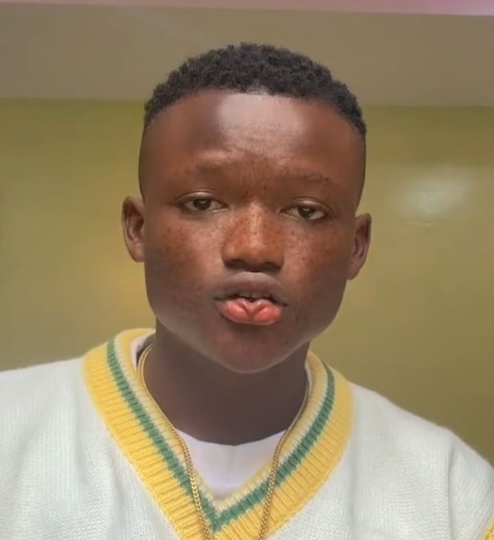 Boy with love-shaped lips