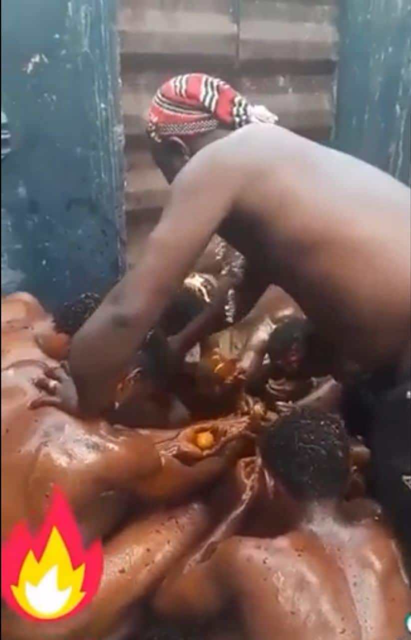 Suspected yahoo boys seen bathing with blood-like liquid during ritual (Video)