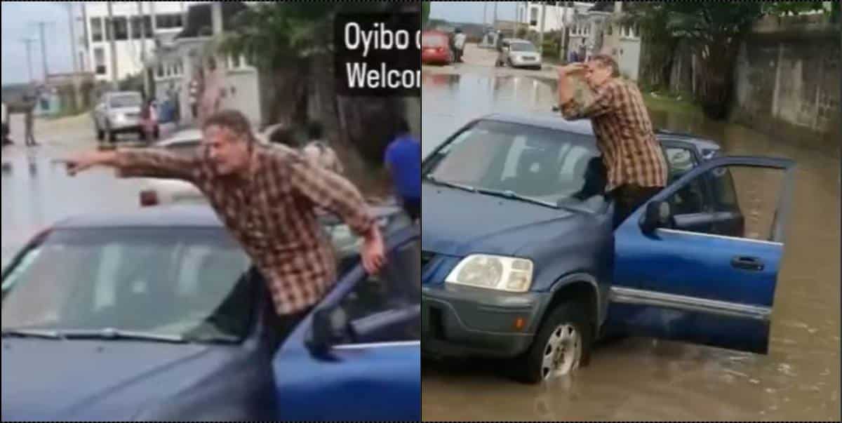 Caucasian man fumes after allegedly tricked into a ditch and asked to pay N50K to move his car (Video)