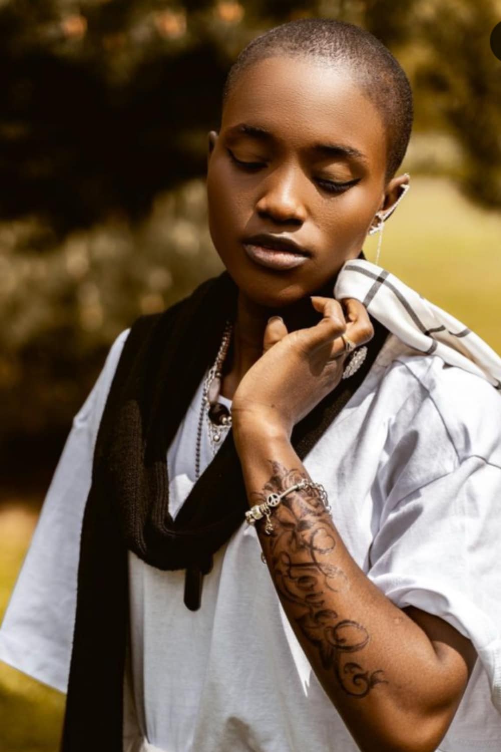 For you to grow, you must first survive the rain”, Bukunmi Oluwasina speaks as she shows off her tattoos