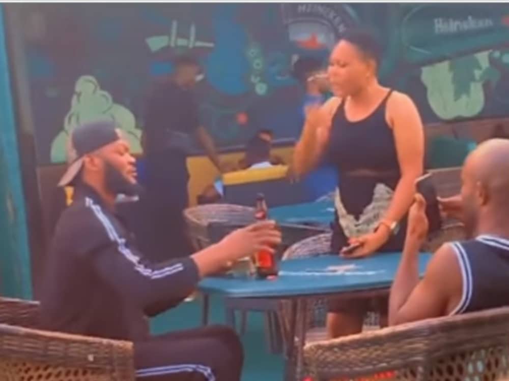 "You've been asking for a date, only to treat me like this" - Nigerian lady tackles man for neglecting her on a date (Video)