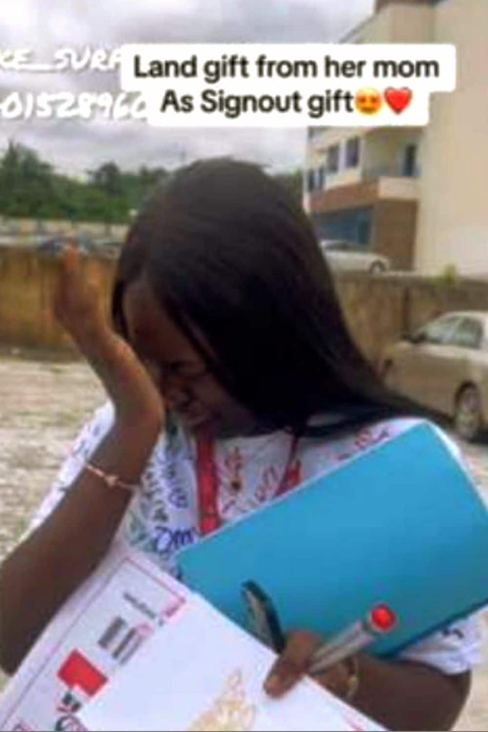 Nigerian Lady overwhelmed with emotion as her mother surprises her with land gift on sign out day