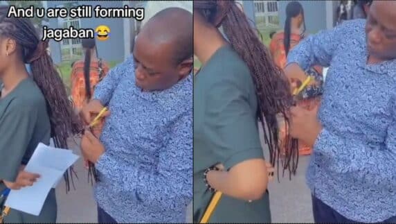 University staff publicly reduces student's hair to approved length (Video)