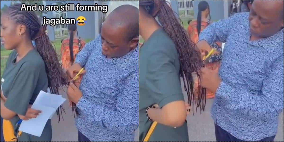 University staff publicly reduces student's hair to approved length (Video)