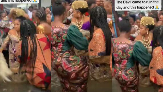 Reactions as bride defies flood to dance with her girls at her wedding