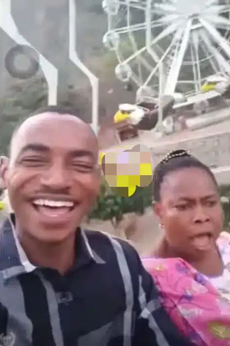 "Stop it!" – Nigerian mom begs in freight as son takes her on flying tower ride in Abuja 