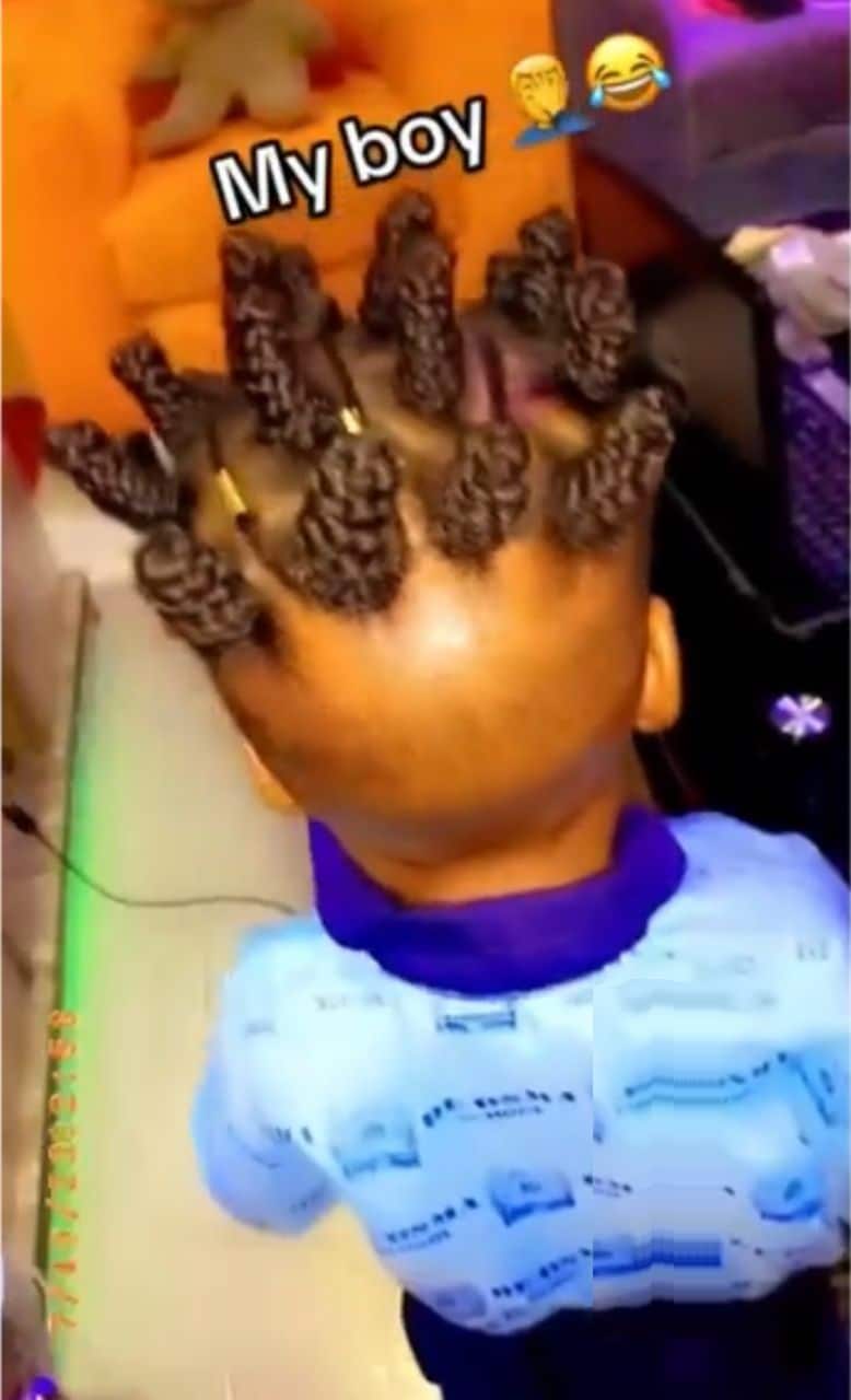 Outrage as parent plaits son's hair (Video)