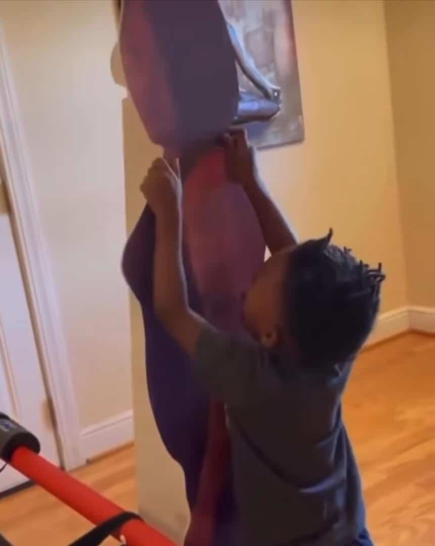 "I miss you mama" — Little boy reminds late mother as he goes about with her photo