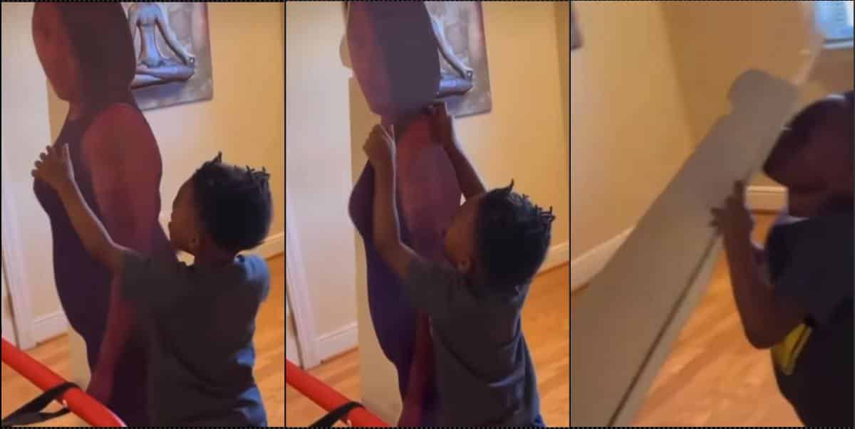 "I miss you mama" — Little boy reminds late mother as he goes about with her photo