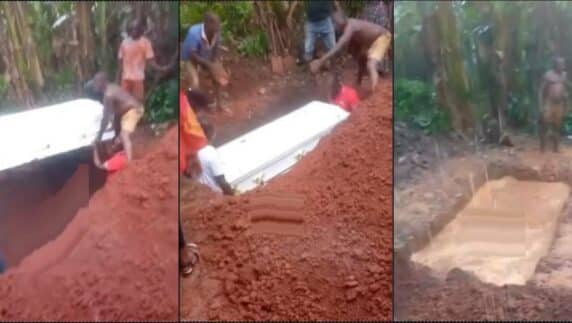 Heavy rain floods grave during funeral (Video)