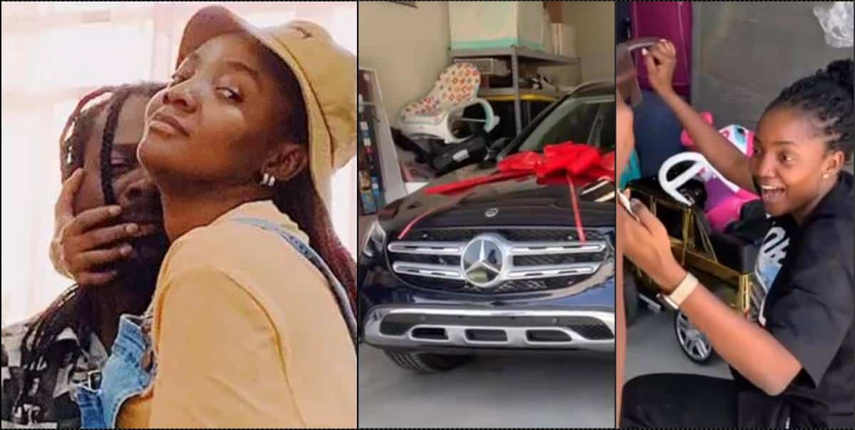 Overjoyed Simi goes down on her knees as Adekunle Gold gifts her Mercedes Benz (Video)