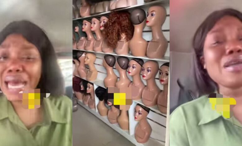 Businesswoman cries bitterly after burglars emptied her hair shop