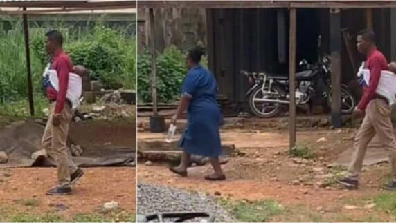 Nigerian man causes a stir as he carries his baby on his back while walking with wife on the road