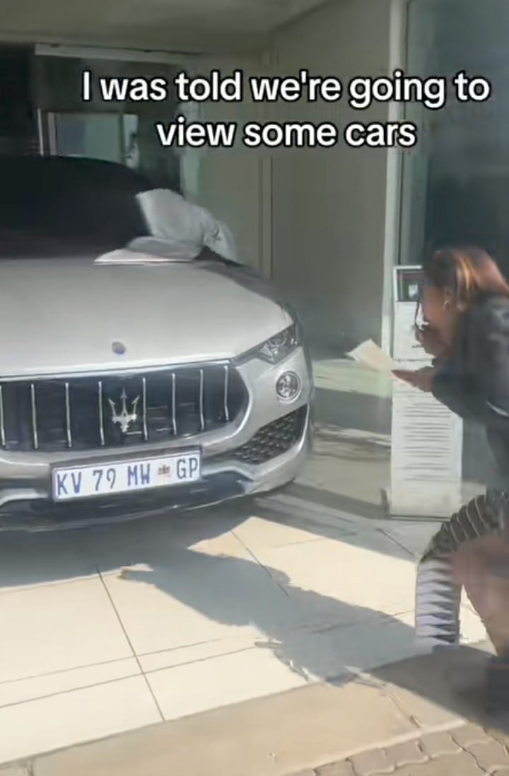 Man surprises girlfriend car