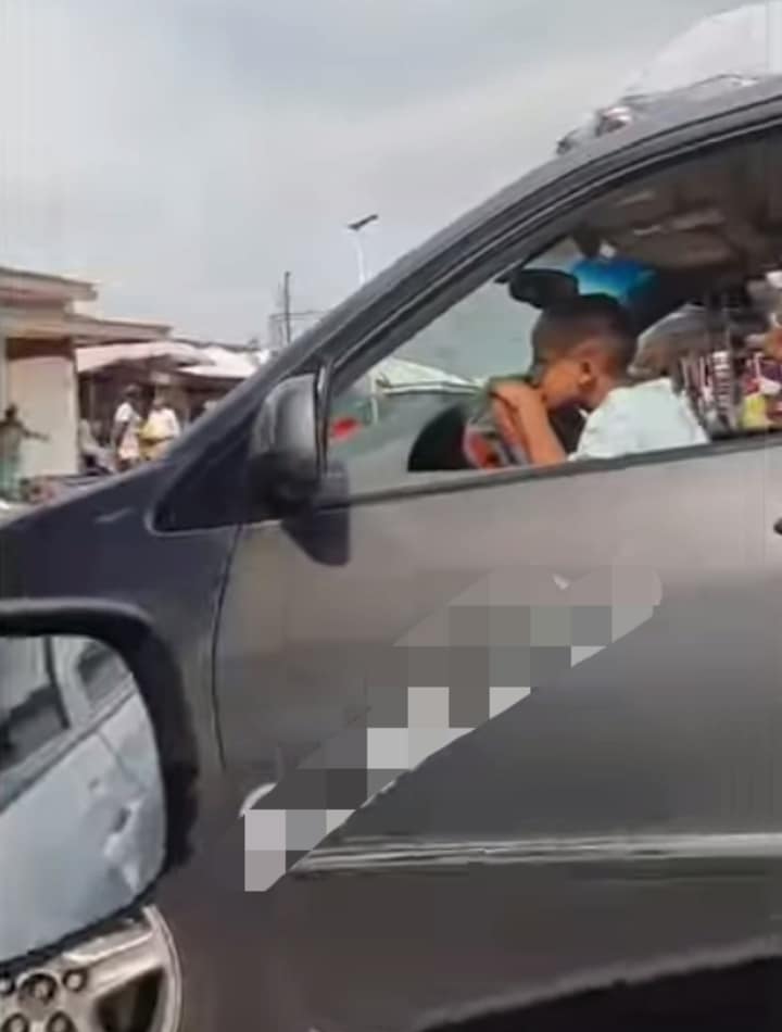 Little boy driving Abuja 