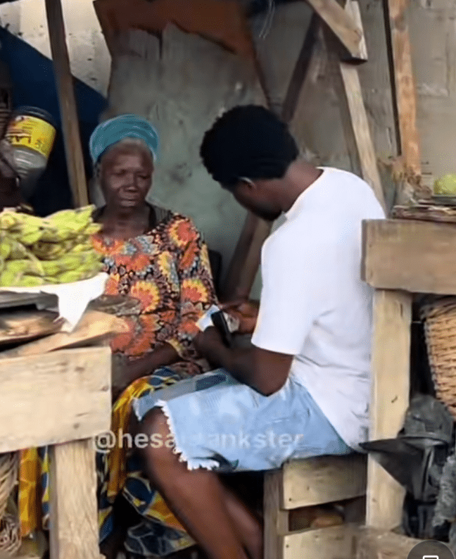 Elderly Woman selling bananas and oranges