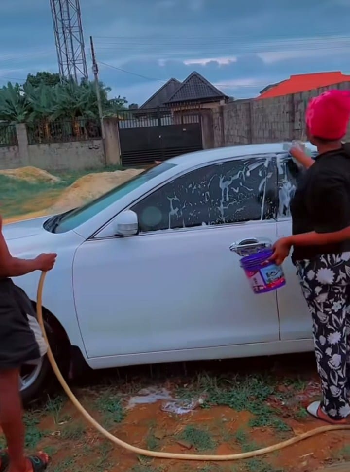 Jealous girlfriend washes boyfriend's car 